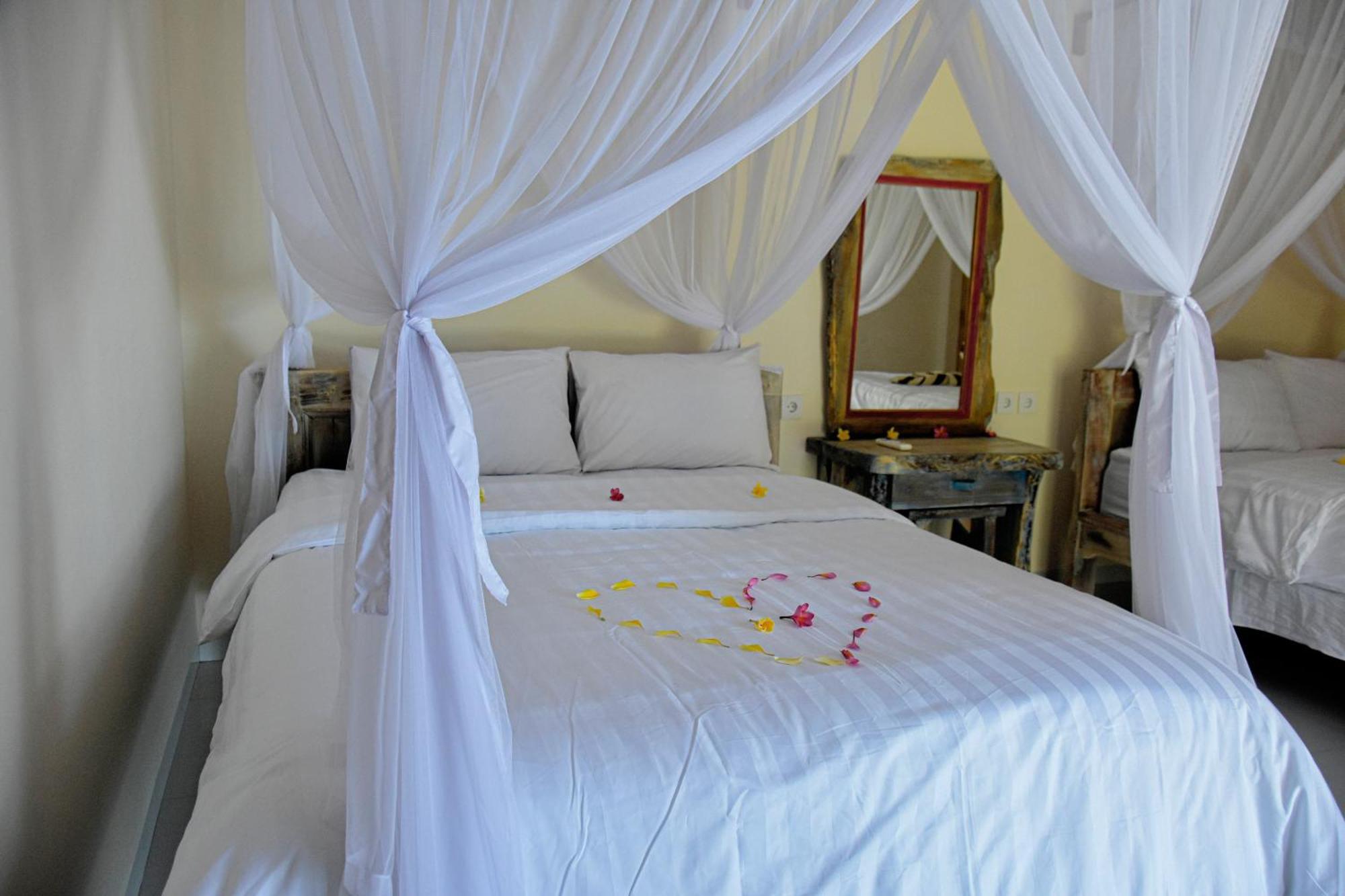 Ganesha Amed Hotel Værelse billede